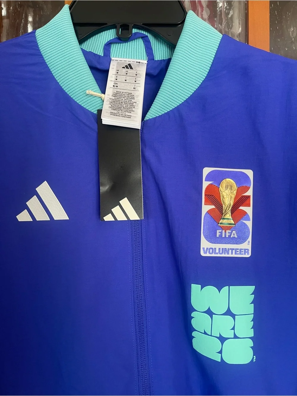 adidas official World Cup Volunteer Blue Sport Jacket with Aqua Trim